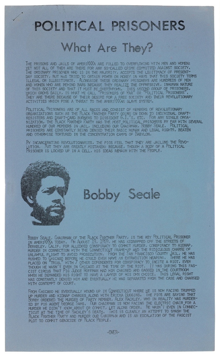 A blue piece of paper with black text printed on it defining political prisoners and the current situation of Bobby Seale as a political prisoner with a print of his head. 