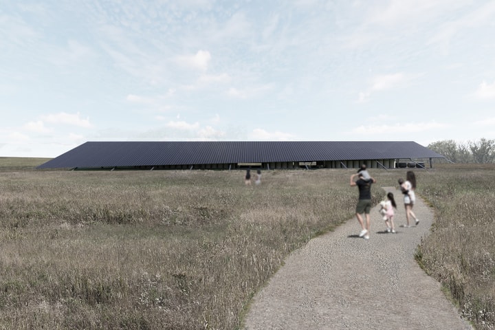 Architectural rendering of a long, low building with a dark sloped roof nestled in a prairie field, with a family walking along a gravel path toward it.
