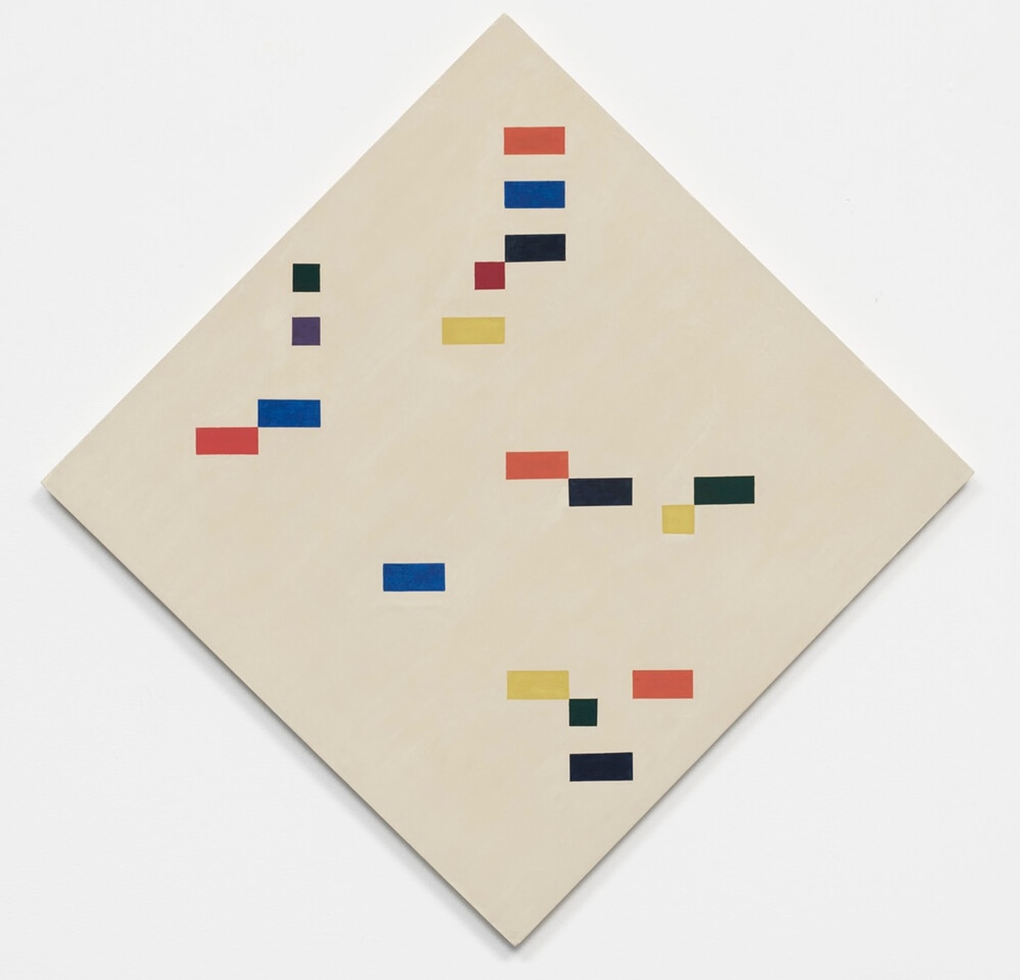 Abstract geometric artwork consisting of small colored rectangles in red, orange, blue, purple, yellow, black and brown arranged across a cream-colored diamond-shaped field.