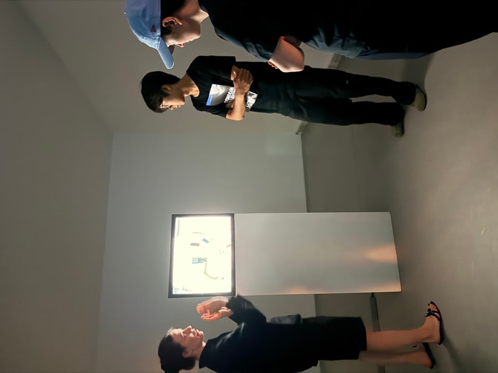 tour guide explaining a film work