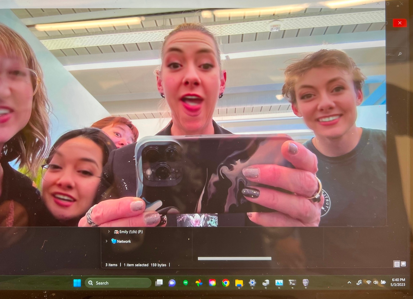 a group of women taking a selfie