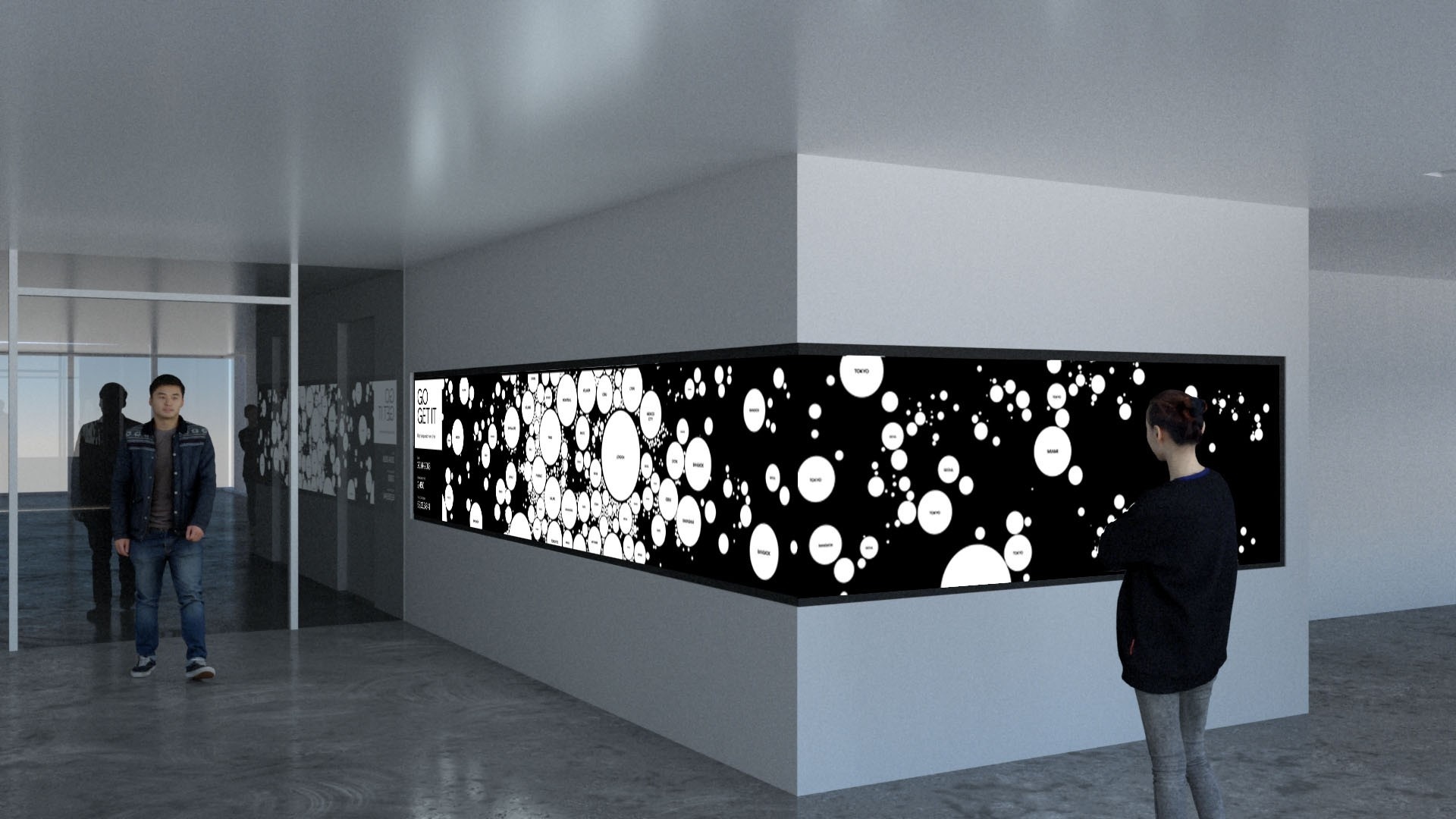Digital screen wrapping around a corner with white circles on black background with two people standing in front of it.