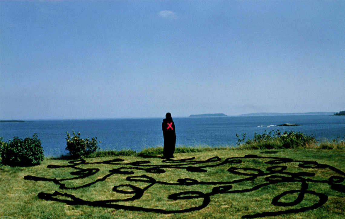 A .gif alternating between an image of a black cloaked figure marked a red X standing in a green field overlooking sky and a body of water surrounded by long, overlapping tendrils of black fabric and, in the second image, a gold compact with the words "I look fabulous but I'm in a lot of pain" etched on its surface sitting on a black backdrop