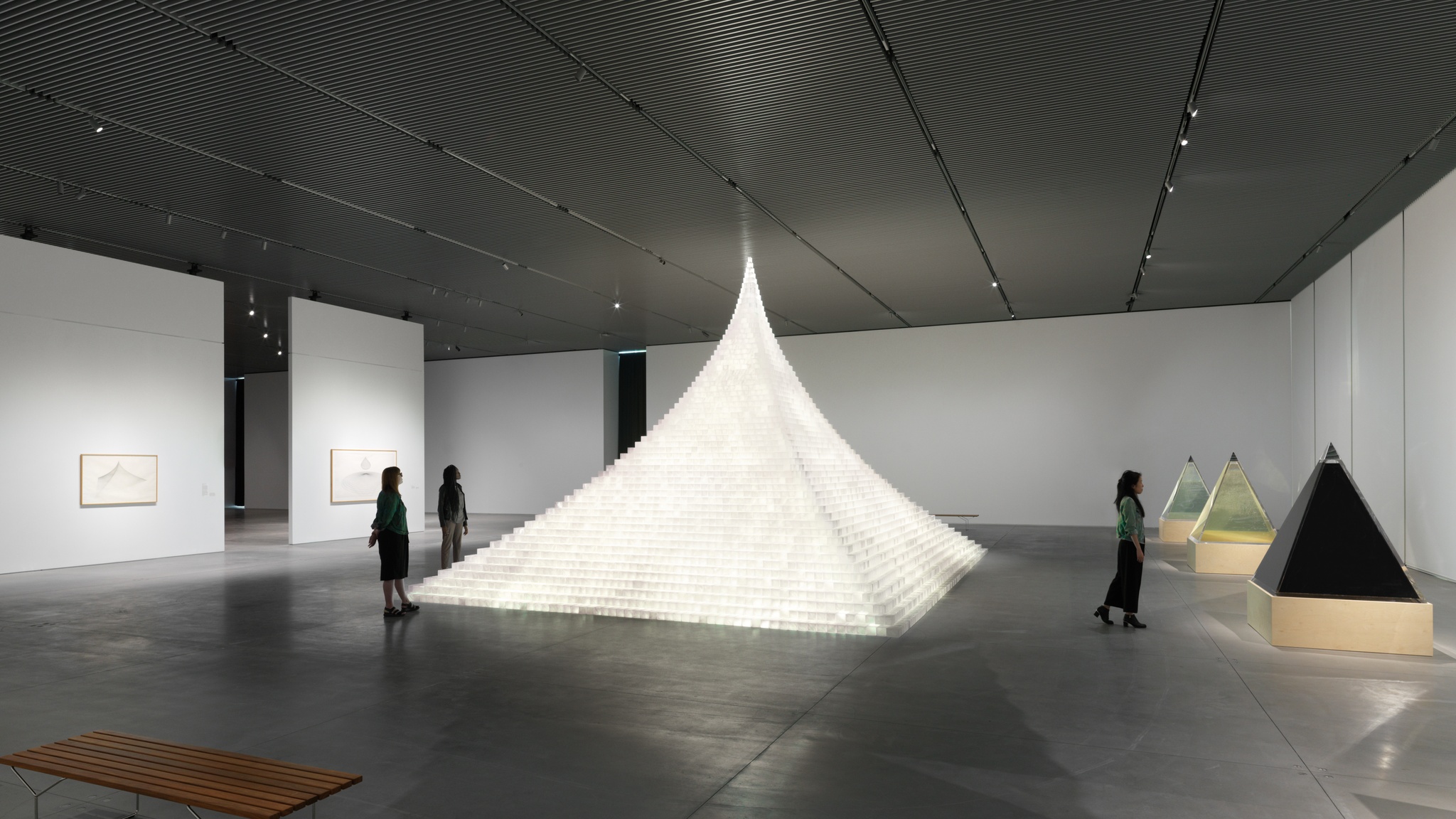 An installation view of Agnes Denes' Crystal Pyramid in *Absolutes and Intermediates*