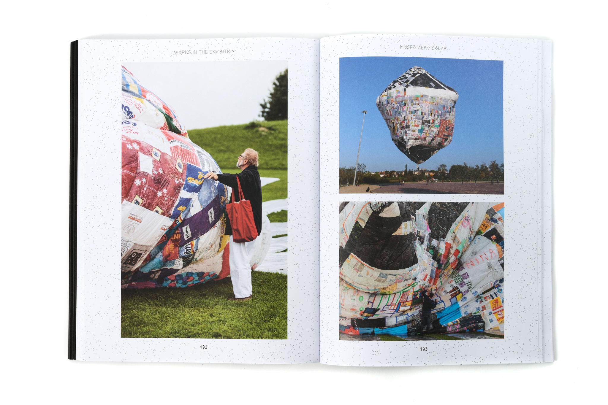 A book open on a white background. The pages display colorful images of hot air balloons pieced together from recycled paper bags. 
