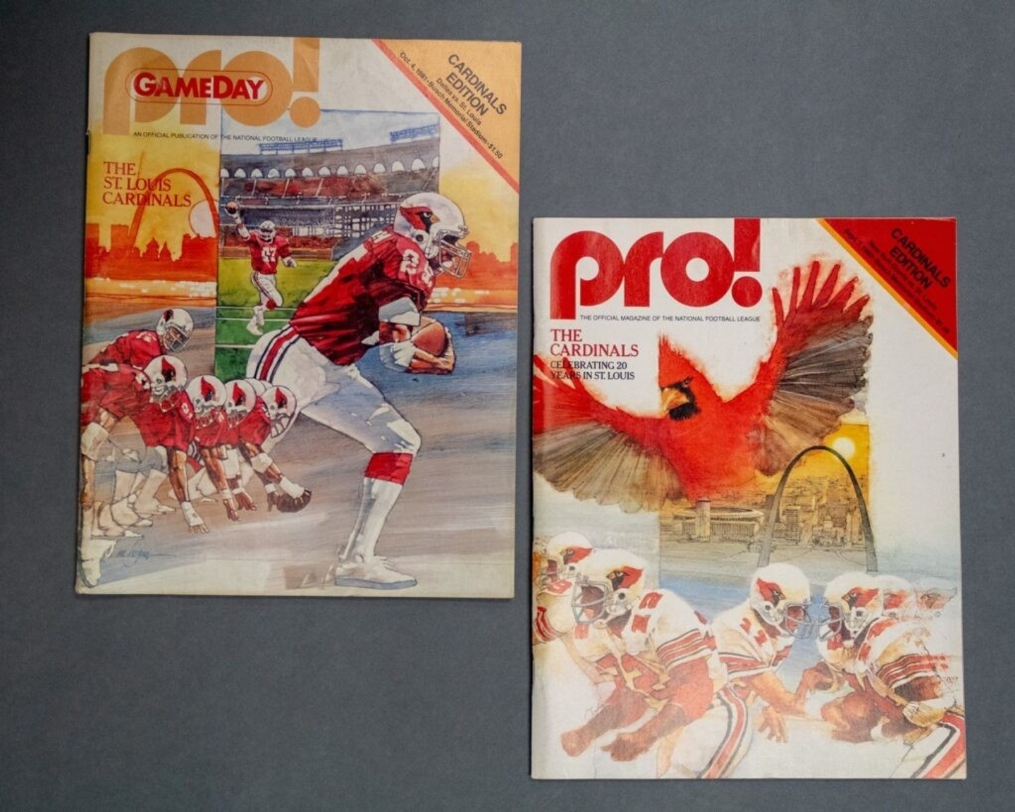 photo of two Pro! magazine covers both featuring illustrations of the Cardinals football team