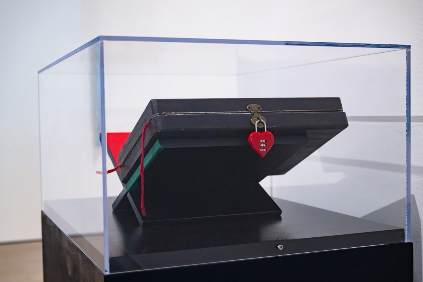 handmade sketchbook in a glass box