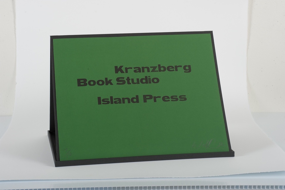Collophon of the black text "Kranzberg Book Studio Island Press" on a green background 
