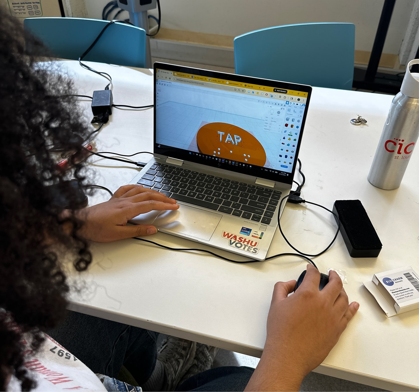 person working on a screen 
