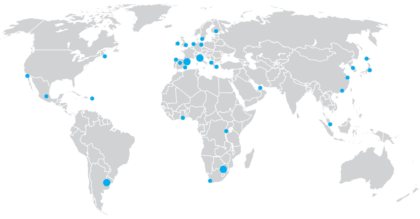 World map with blue dots marking locations around the globe; see accompanying "Past Destinations" text.
