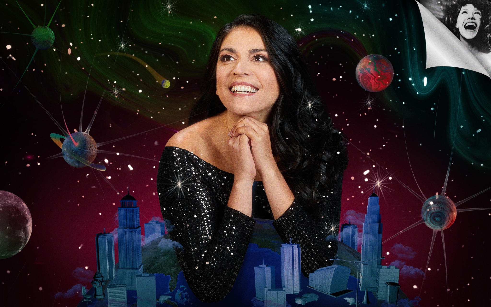 The actor Cecily Strong with her arms propping her head up as she leans on a model city. Behind her is a cartoonish background of stars and planets. She wears a black sequined top that sparkles in the light.