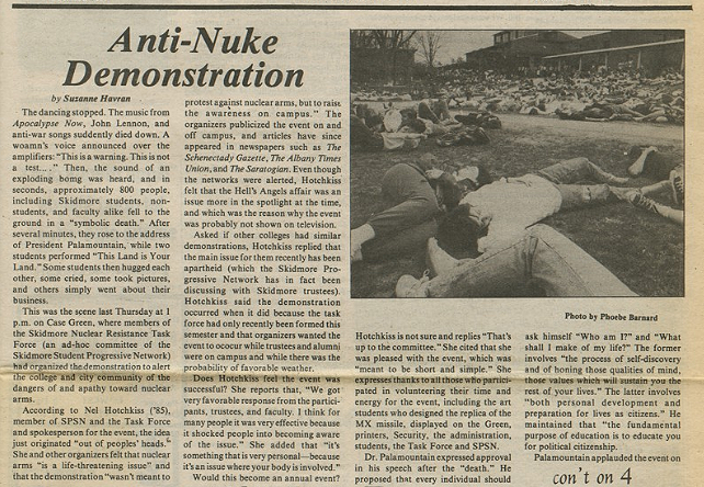 A yellowed newspaper excerpt says “Anti-Nuke demonstration” written in large bold font, accompanied by smaller text. On the right, there is a black and white photograph of students lying down on the grass outside a building.