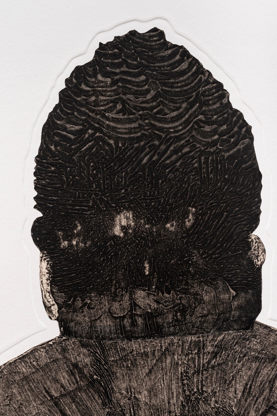 textured head of printed figure from the back