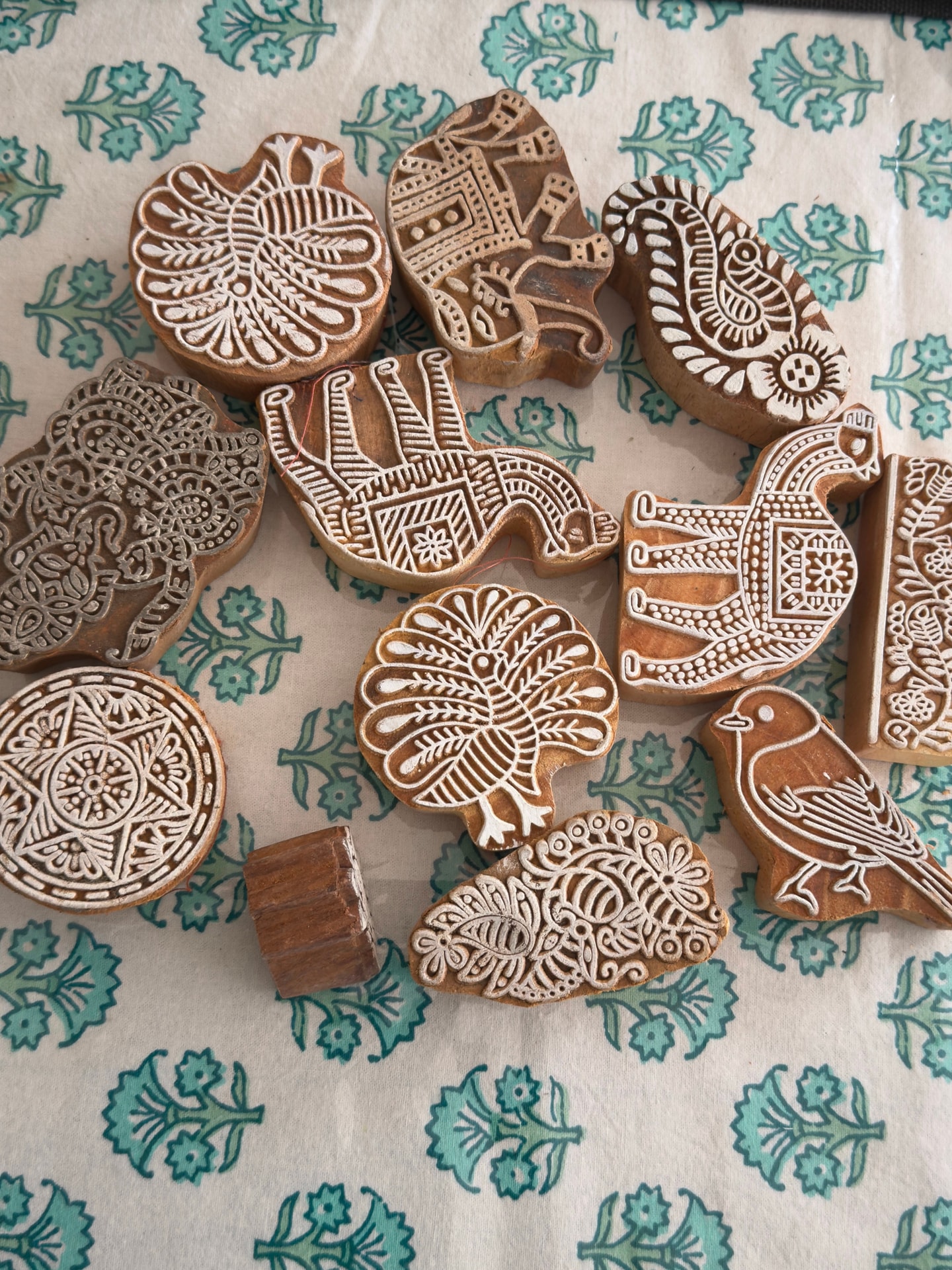 several block print stamps sitting on top of paper 