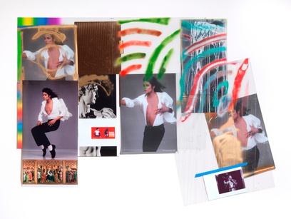 In a colorful collage, multiple posters of a dancing Michael Jackson mingle with two metallic panels and a poster of Michelangelo's famous sculpture, David. In one poster, MJ is mid-dance-move balancing on his tip-toes; he seems to defy gravity. Bronze spray paint adorns the head of David and the head and chest of one of the Michaels. The body of another Michael, covered by an angled rectangle of clear plastic, seems to meet a cloud of bronze paint mid-air. That Michael has a smaller Michael attached to it with blue tape. Soft curved stripes of red, green, and turquoise spray paint, and a hard dripping stripe of white, overlay the upper right side of the piece. In the lower left corner is a small reproduction of an elaborate gilded triptych depicting the Three Kings at the birth of Jesus.
