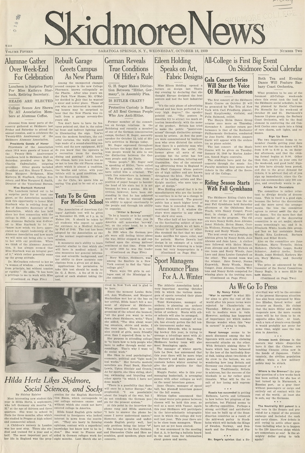   The yellowed front page of the Skidmore News features several columns of small-print text with a black and white photograph of a young light-skinned woman in the bottom left page. 