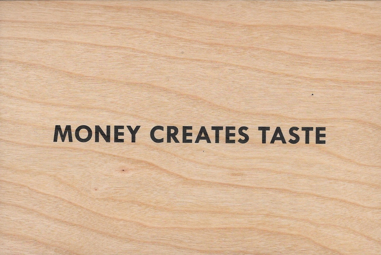 Money Creates Taste Wooden Postcard [Black Text]