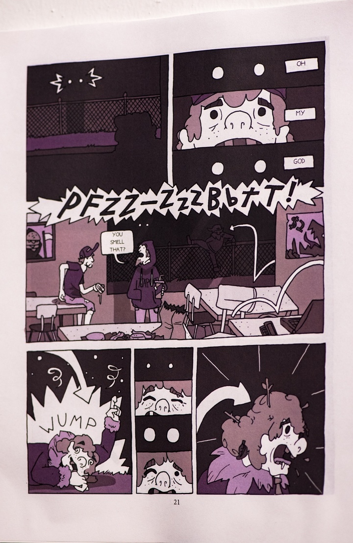 Single comics page in black and purple. A person with wild hair is climbing over a chain link fence outside a school at night.
