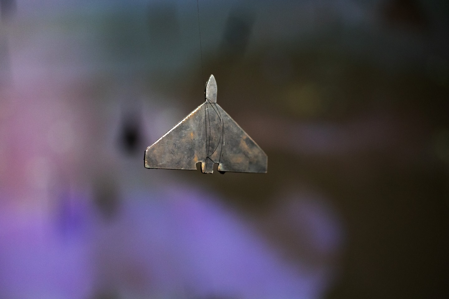 still of film, close up of small metal object