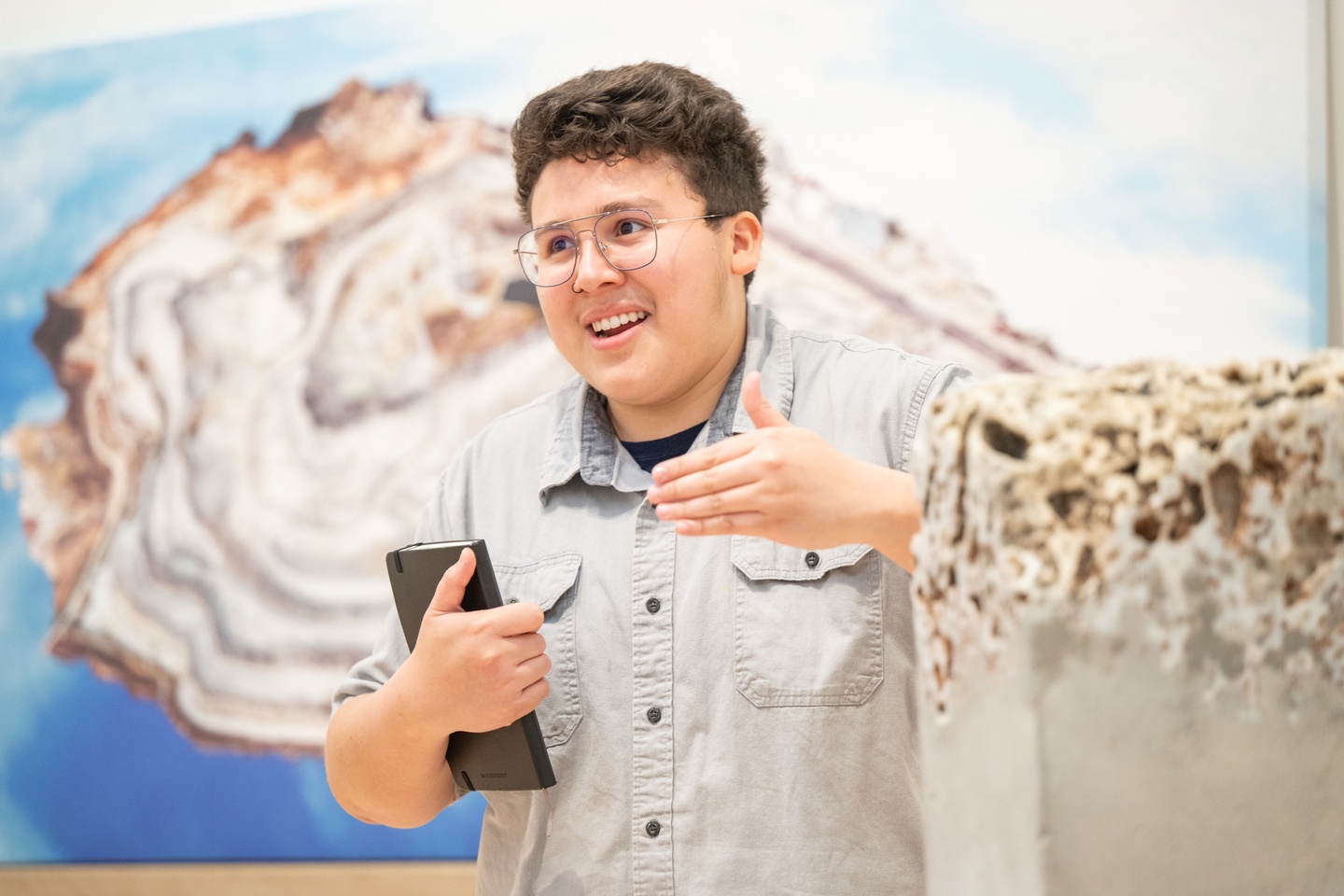 Joseph in front of his large print 