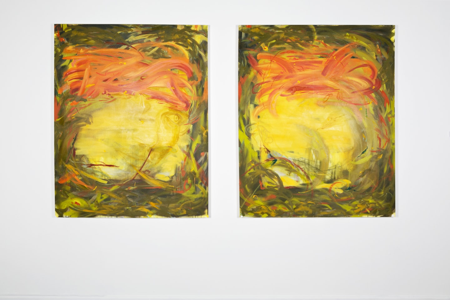 two painting in oranges and yellows