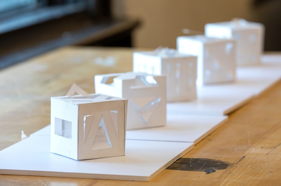 Small paper cutout cubes