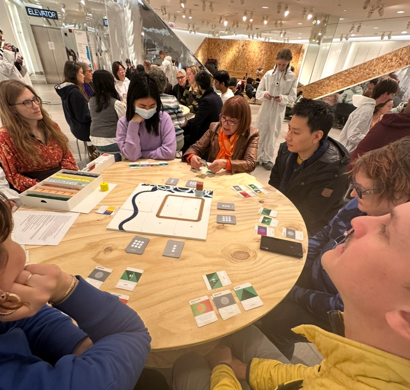 people playing a table top game