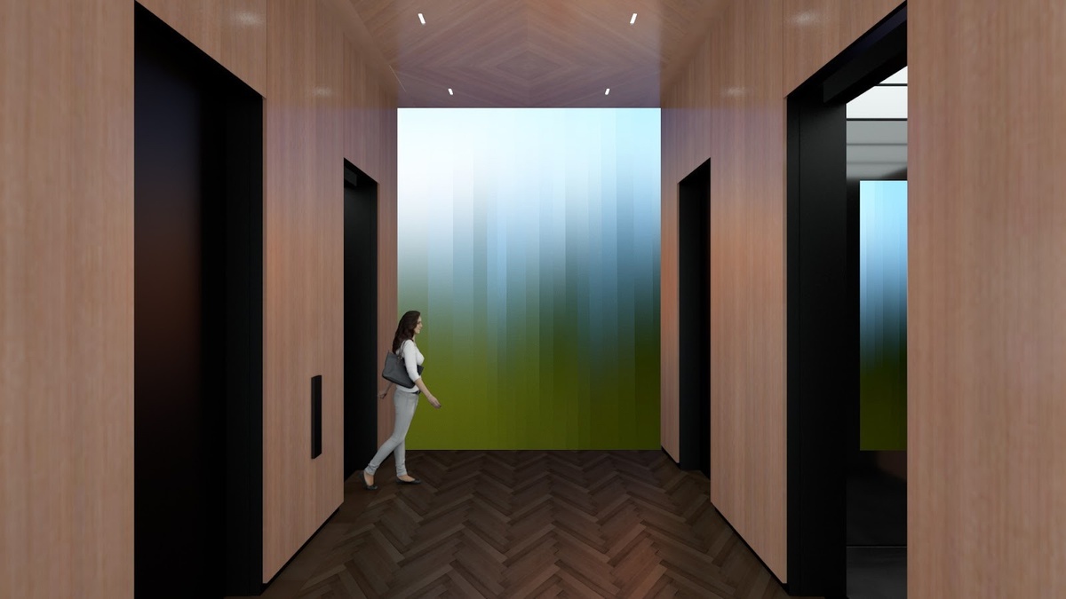 Woman in elevator bank with abstract green and blue content