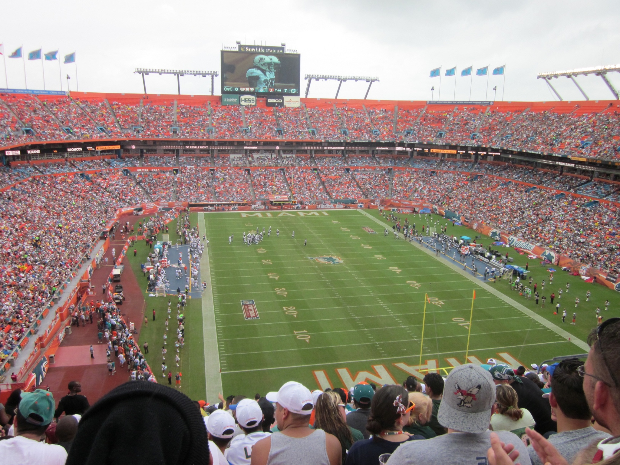 A crowd in a stadium watching a football game