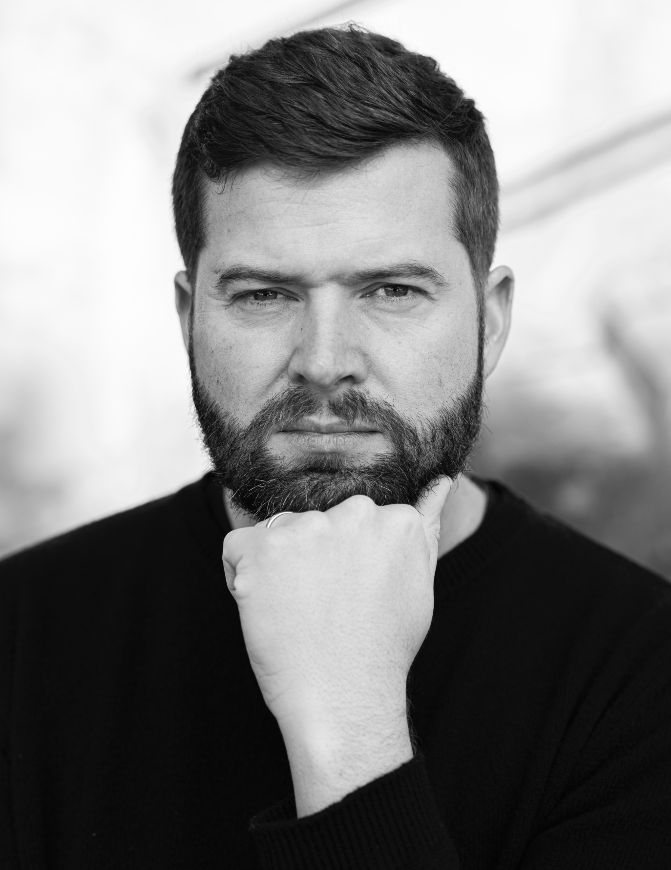 Black-and-white headshot of Christopher Stark.