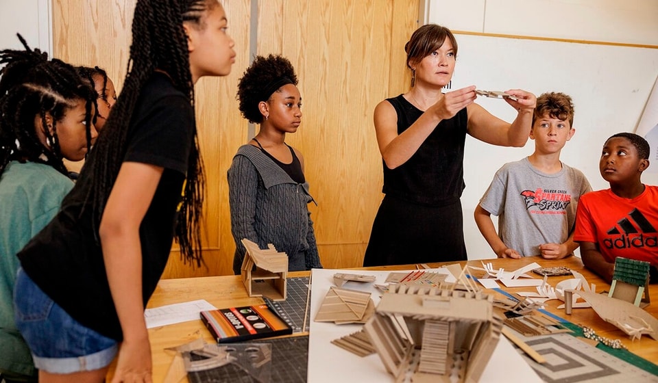 Faculty member working with students
